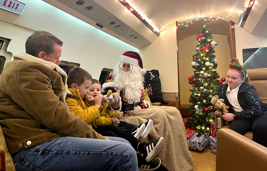 Santa in plane cabin